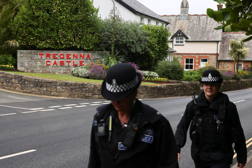 Police officers walk past Tregenna Castle ahead of the G7 summit, in Carbis Bay, Cornwall, Britain, June 5, 2021. REUTERS/Tom Nicholson