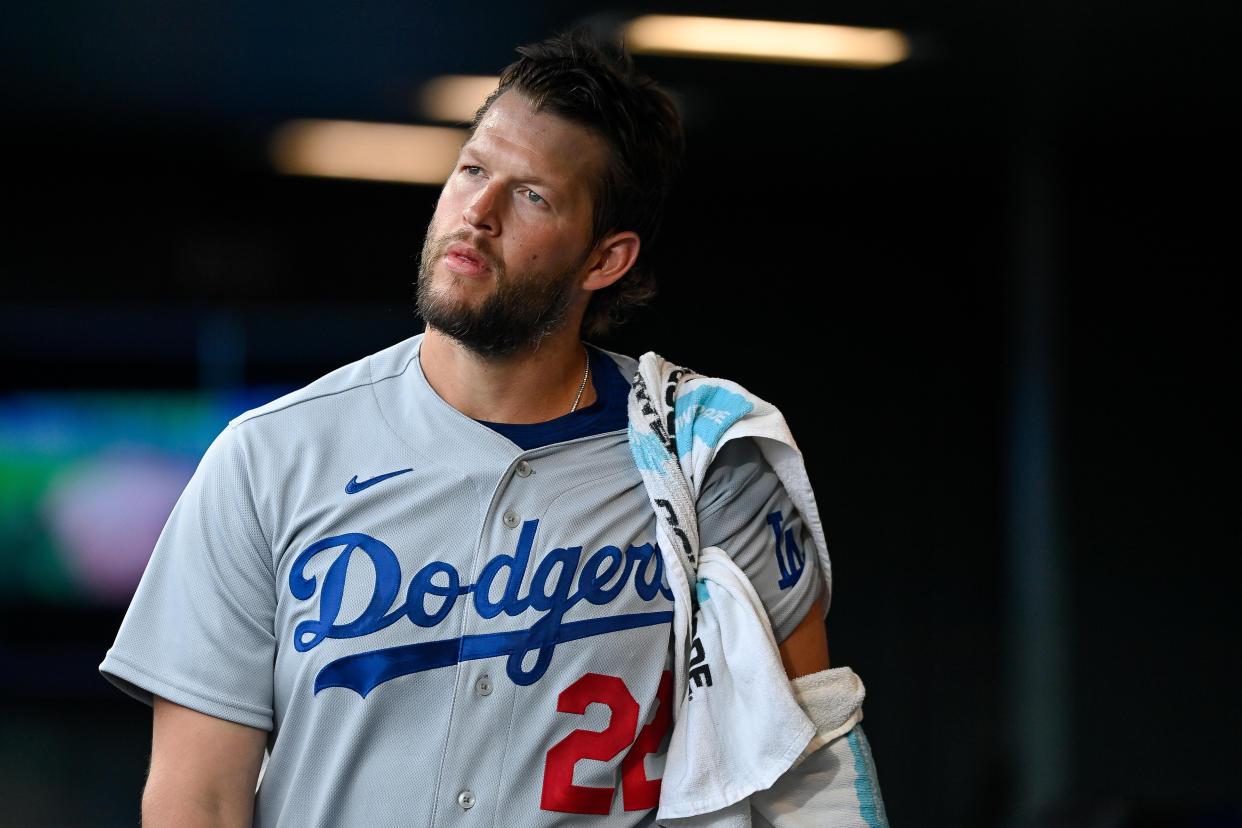 DENVER, CO - JULY 30: Los Angeles Dodgers starting pitcher Clayton Kershaw (22) looks on from the dugout during a game between the Los Angeles Dodgers and the Colorado Rockies at Coors Field on July 30, 2022 in Denver, Colorado. (Photo by Dustin Bradford/Icon Sportswire via Getty Images)