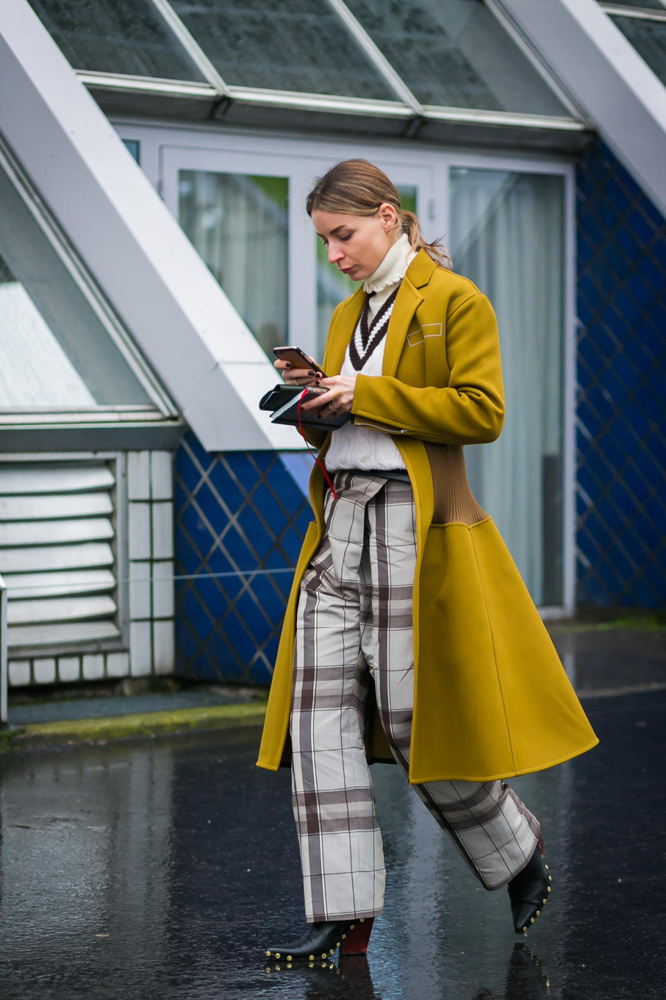 Canary yellow was a major theme in Milan, but in Paris, Irina Lakicevic embraced mustard yellow instead.