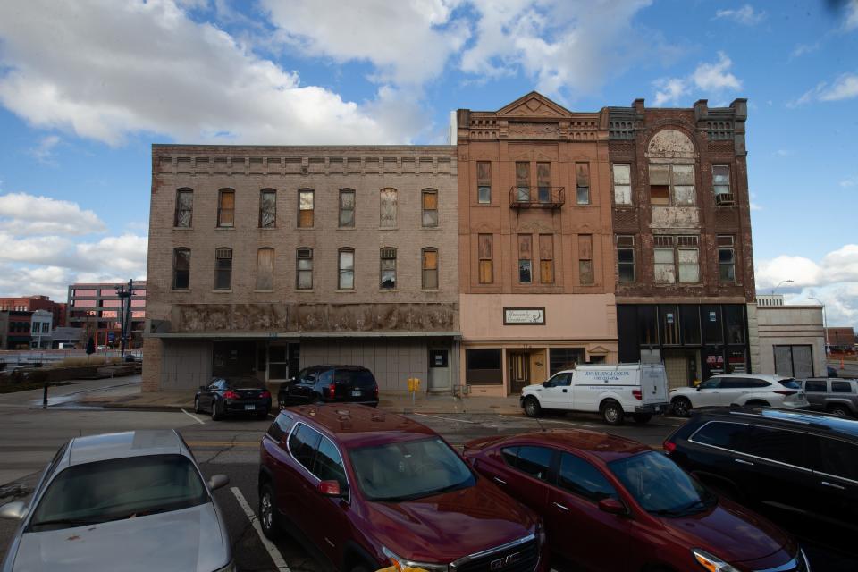 These downtown Topeka buildings formerly owned by Black Topeka newspaper editor Nick Chiles are back on the market.