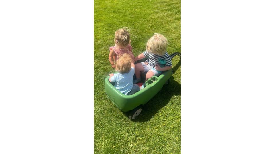 A photo of Romy Wilfred and Frankie Johnson in the garden