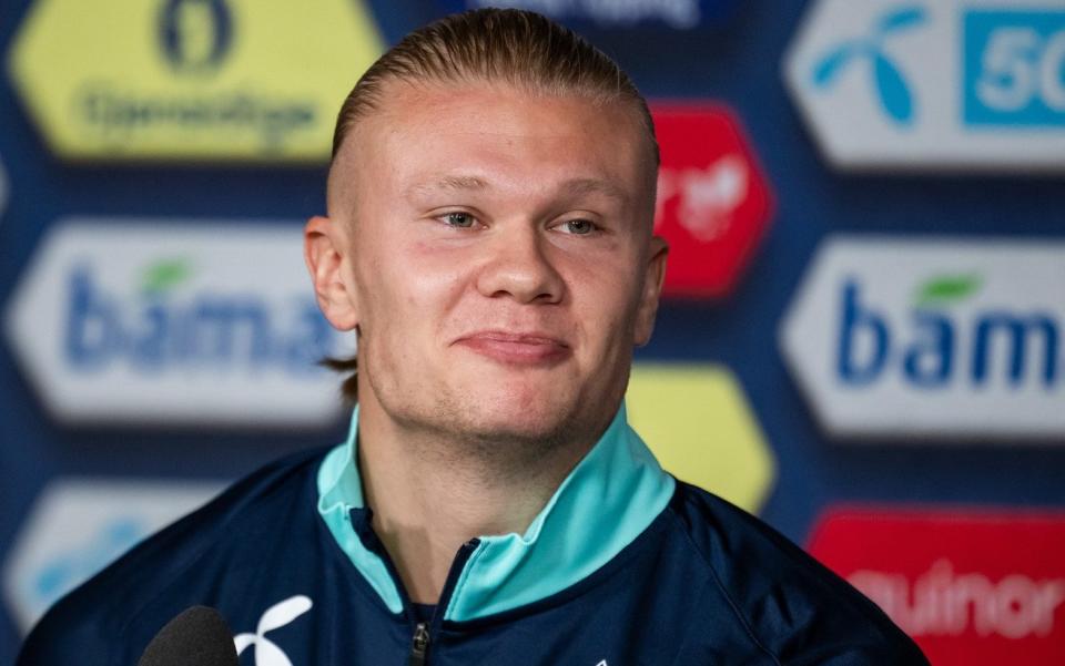 Norway striker Erling Haaland speaks to the press while on international duty