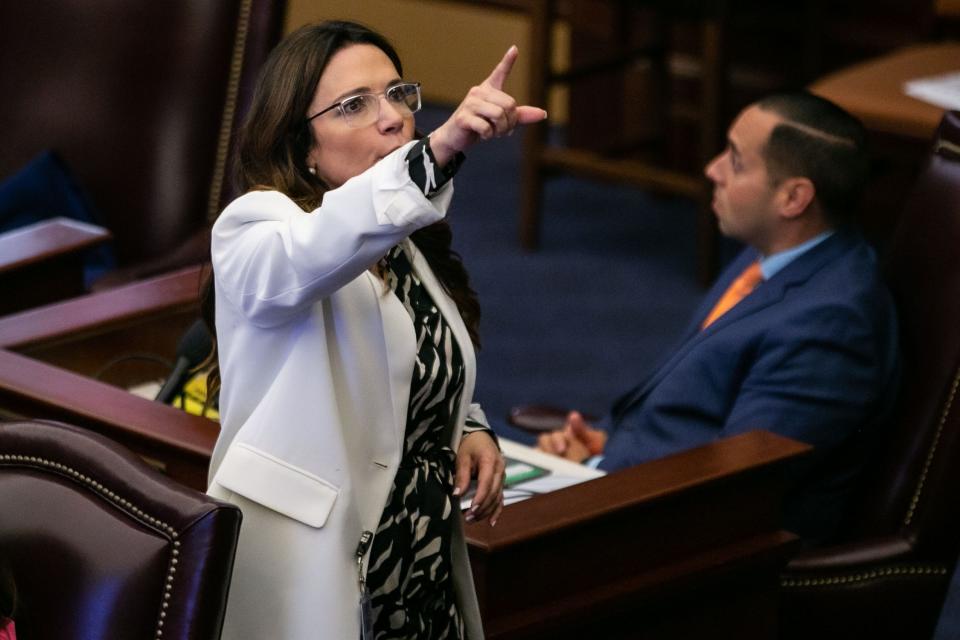 Florida Republican state Sen. Ileana Garcia responds to protesters in the gallery during debate on an abortion bill Monday.