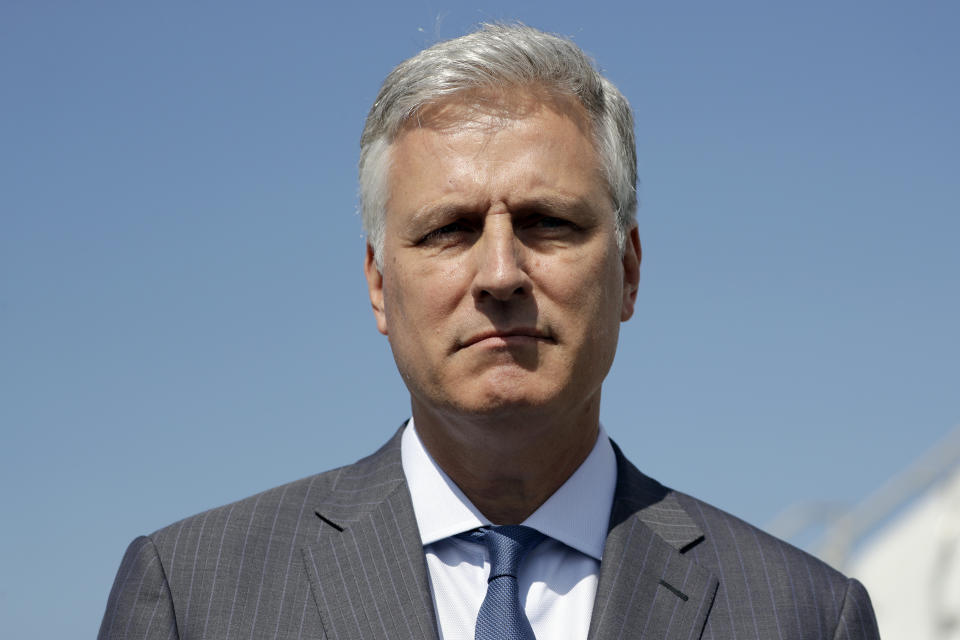 Robert O'Brien, just named as the new national security adviser, listens as President Donald Trump speaks before they board Air Force One at Los Angeles International Airport, Wednesday, Sept. 18, 2019, in Los Angeles. (AP Photo/Evan Vucci)