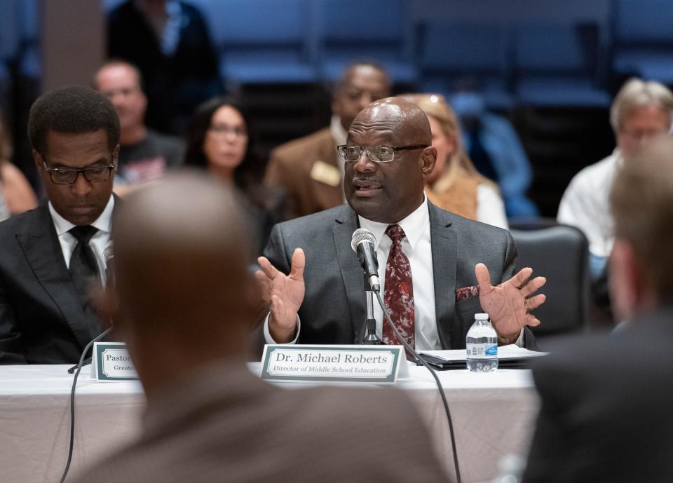 Michael Roberts, director of middle school education for the Escambia County School District, speaks Tuesday during the Gun Violence Roundtable hosted by the Escambia County Sheriff’s Office at the Brownsville Community Center in Pensacola.