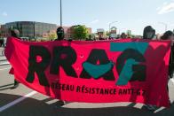 <p>Protesters march in Quebec City on June 8, 2018, as the G7 Summits gets underway. (Photo: Alice Chiche/AFP/Getty Images) </p>