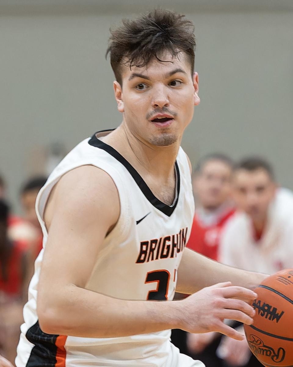 Brighton senior Ashton Tomassi is the Livingston County boys basketball Player of the Year for the second straight season.