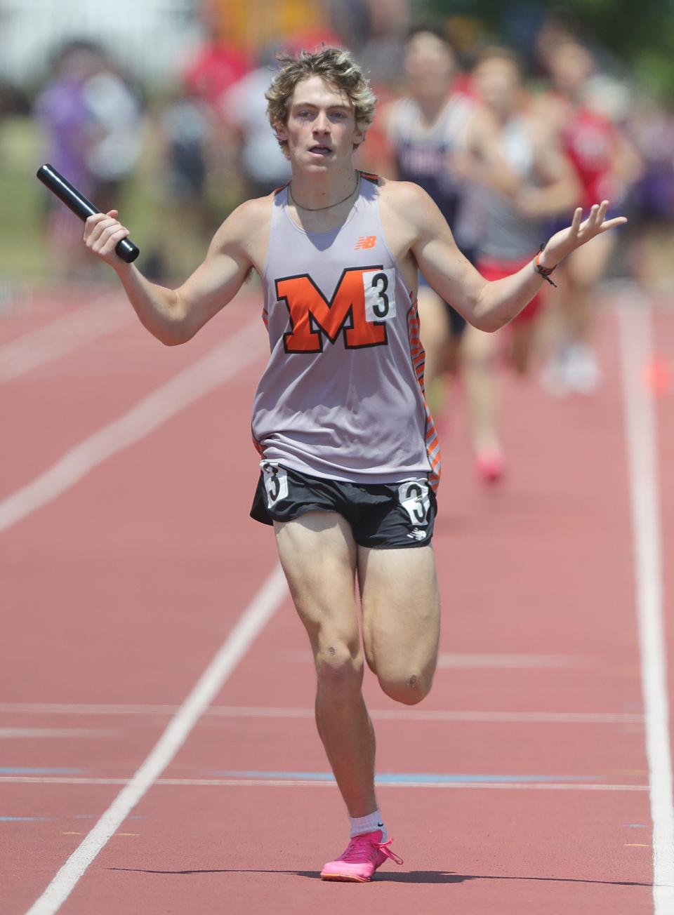 Marlington's Colin Cernasky reacts as he crosses the finish line first in the Division II 3,200-meter relay at the OHSAA state meet, Friday, June 2, 2023, in Columbus.