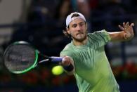 Tennis - ATP - Dubai Open - Semifinal - Dubai, United Arab Emirates - March 2, 2018. Lucas Pouille of France in action against Filip Krajinovic of Serbia. REUTERS/Satish Kumar