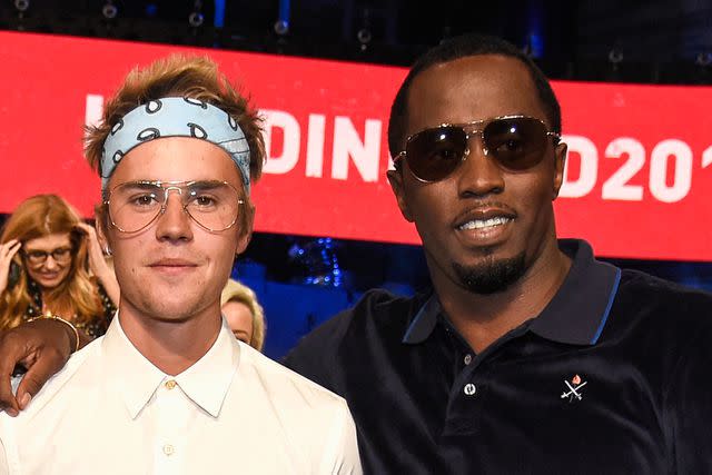 <p>Kevin Mazur/Hand in Hand/Getty</p> Justin Bieber and Sean 'Diddy' Combs