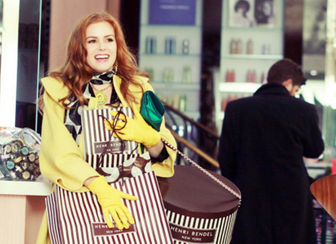 Pictured: Isla Fisher plays Rebecca Bloomfield in Confessions of a Shopaholic.