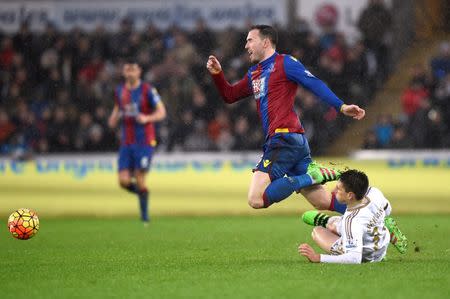 Football Soccer - Swansea City v Crystal Palace - Barclays Premier League - Liberty Stadium - 6/2/16 Swansea's Federico Fernandez fouls Crystal Palace's Jordon Mutch Mandatory Credit: Action Images / Rebecca Naden Livepic