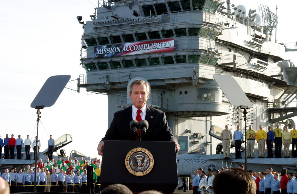 Image: Then-President George W. Bush declares the end of major combat in Iraq aboard the aircraft carrier USS Abraham Lincoln near the California coast on May 1, 2003. (J. Scott Applewhite / AP file)