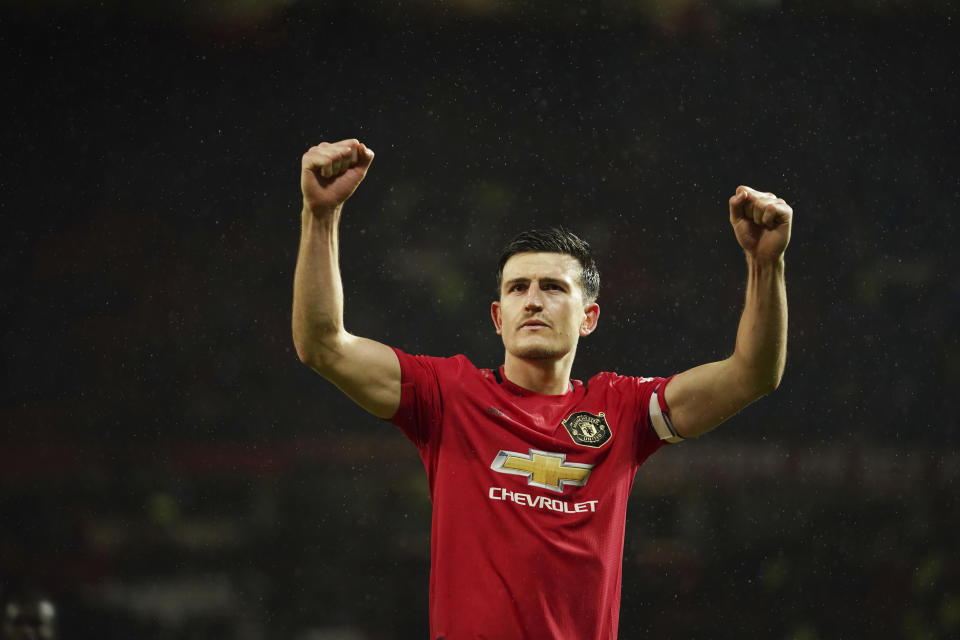 Manchester United's Harry Maguire celebrates after the English Premier League soccer match between Manchester United and Manchester City at Old Trafford in Manchester, England, Sunday, March 8, 2020. Manchester United won 2-0. (AP Photo/Dave Thompson)