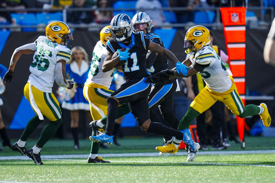 Carolina Panthers wide receiver Ihmir Smith-Marsette runs for a touchdown against the Green Bay Packers during the first half of an NFL football game Sunday, Dec. 24, 2023, in Charlotte, N.C. (AP Photo/Rusty Jones)