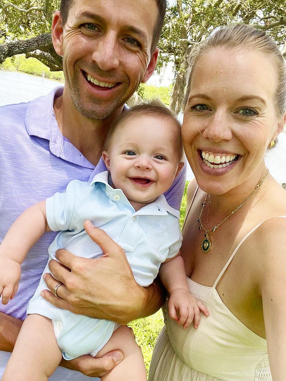 Mark Bresnahan with his 5-month-old son Bryson and his wife, Jenn.