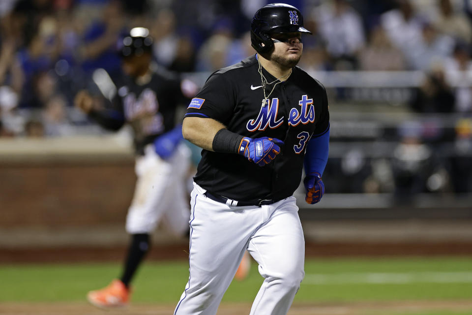 New York Mets designated hitter Daniel Vogelbach runs after hitting a run-scoring single against the Seattle Mariners during the eighth inning of a baseball game Friday, Sept. 1, 2023, in New York. (AP Photo/Adam Hunger)