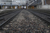 High-speed trains park at the Gare Montparnasse train station, Friday, Dec. 6, 2019 in Paris. Frustrated travelers are meeting transportation chaos around France for a second day, as unions dig in for what they hope is a protracted strike against government plans to redesign the national retirement system. (AP Photo/Thibault Camus)