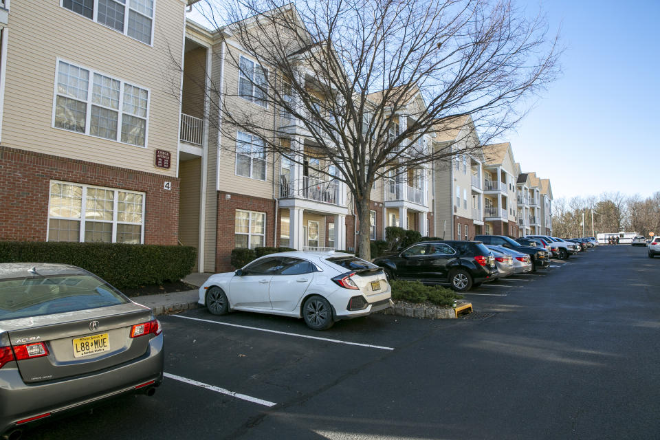 The home of 30-year-old Sayreville Councilwoman Eunice Dwumfour, in the second building from the left, is in Sayreville, N.J., on Thursday, Feb. 2, 2023. Authorities say the young mother who served on her borough council was found shot to death in an SUV parked outside her suburban home. The Middlesex County prosecutor's office says Dwumfour was found in the vehicle at around 7:20 p.m. Wednesday. (AP Photo/Ted Shaffrey)