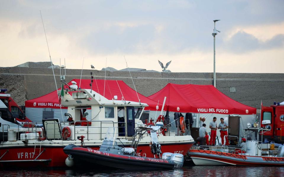 Rescue workers at the scene of the Bayesian sinking in Porticello