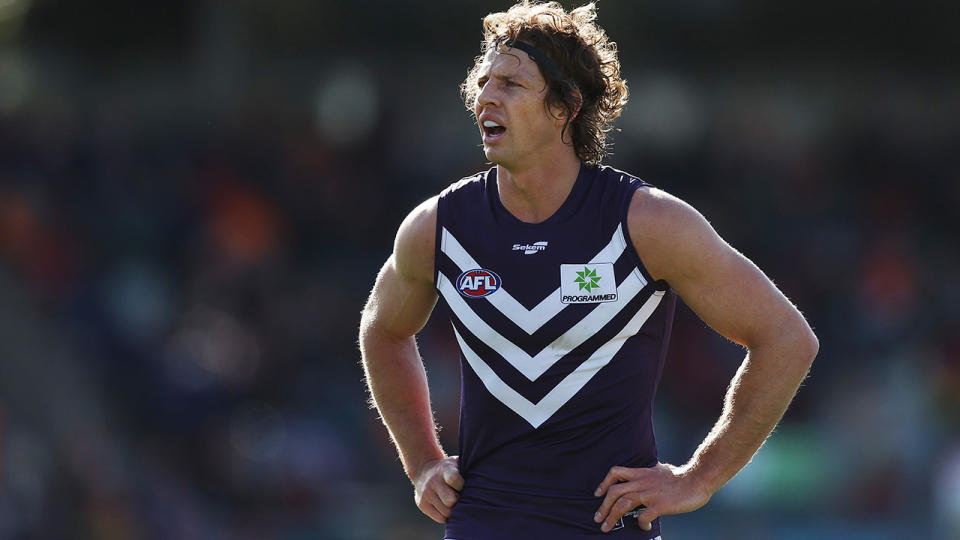 Nat Fyfe is pictured playing for Fremantle.