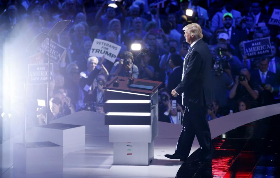 Donald Trump appears onstage Monday night to introduce his wife, Melania, at the Republican National Convention in Cleveland. (Photo: Carlo Allegri/Reuters)