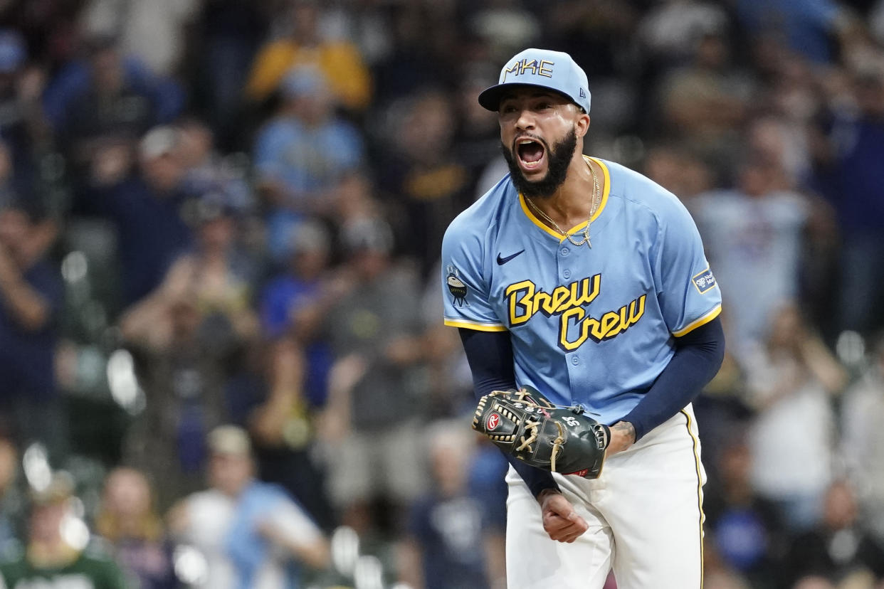 Milwaukee Brewers' Devin Williams reacts after recording a save during the ninth inning of a baseball game against the Arizona Diamondbacks, Sunday, Sept. 22, 2024, in Milwaukee. (AP Photo/Aaron Gash)