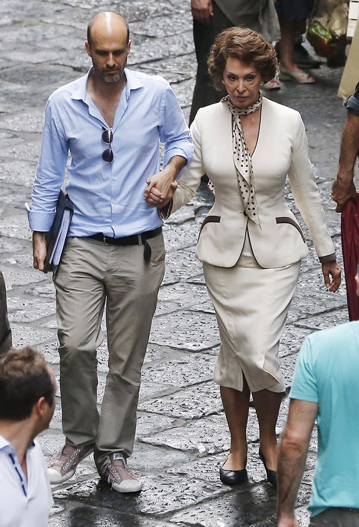 Sophia Loren with Enrico Loverso on a film set 'La Voce Umana' in Naples