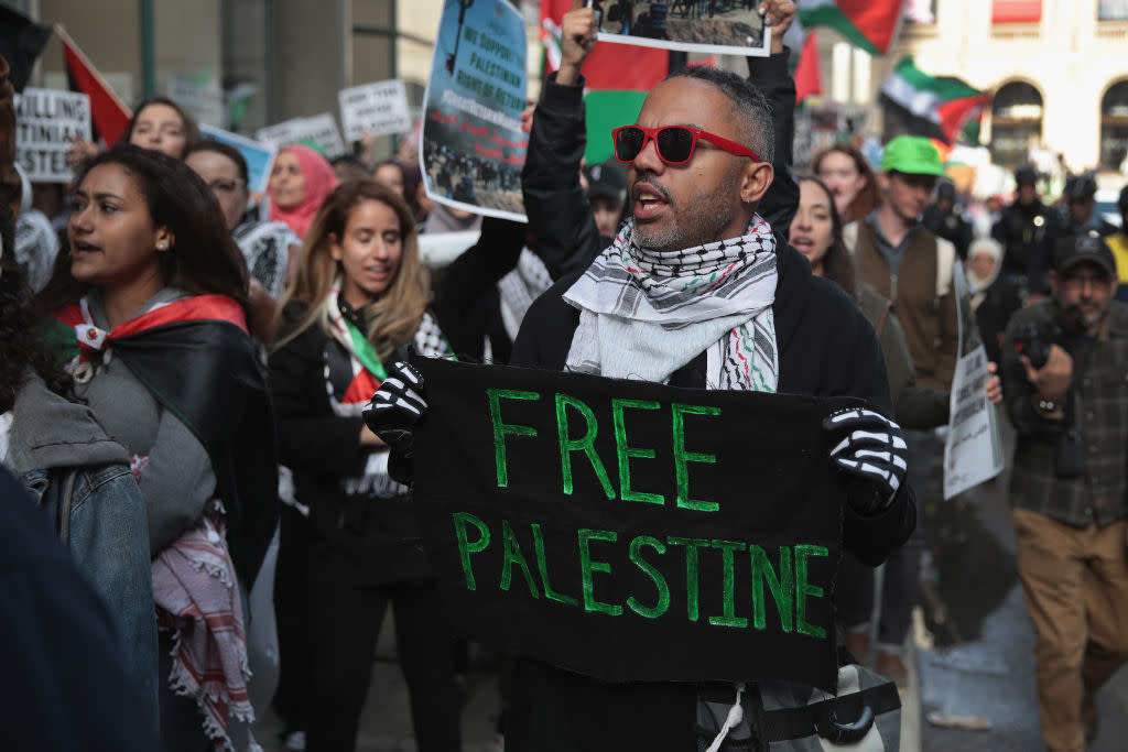 In May 2018, members of the Palestinian community and their supporters protested then-President Donald Trump's decision to move the U.S. Embassy in Israel from Tel Aviv to Jerusalem. This year, Palestinians' backers are protesting the Israel-Hamas war in Gaza and U.S. military support for Israel. (Photo by Scott Olson/Getty Images)