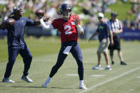 Seattle Seahawks quarterback Drew Lock passes during NFL football practice Wednesday, Aug. 3, 2022, in Renton, Wash. (AP Photo/Ted S. Warren)