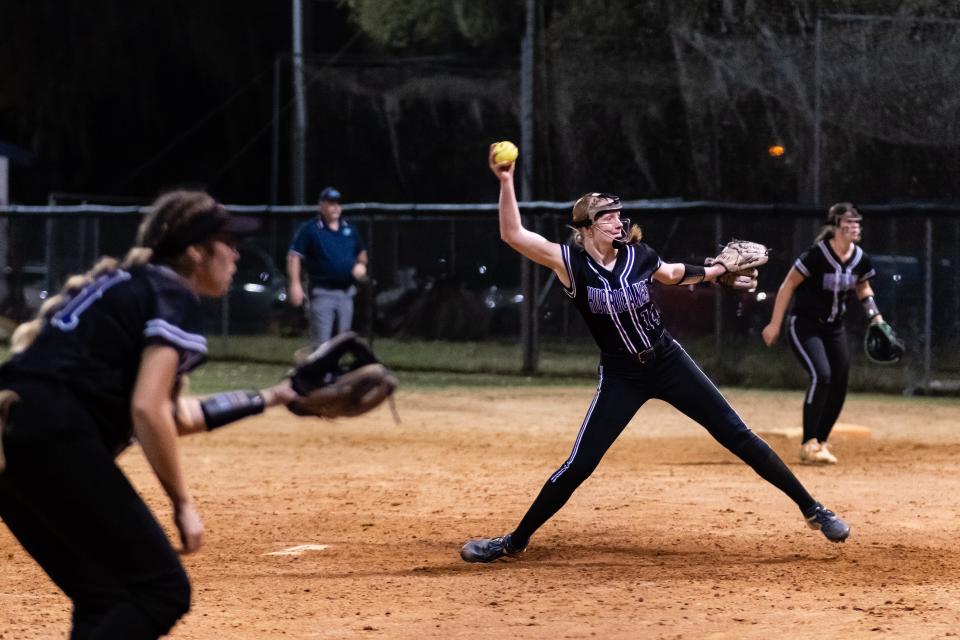 Gainesville High Schools Leanna Bourdage (14) pitches the ball during a softball game between Gainesville High School and Trenton High School at Gainesville High School in Gainesville, FL on Thursday, March 7, 2024. [Chris Watkins/Gainesville Sun]
