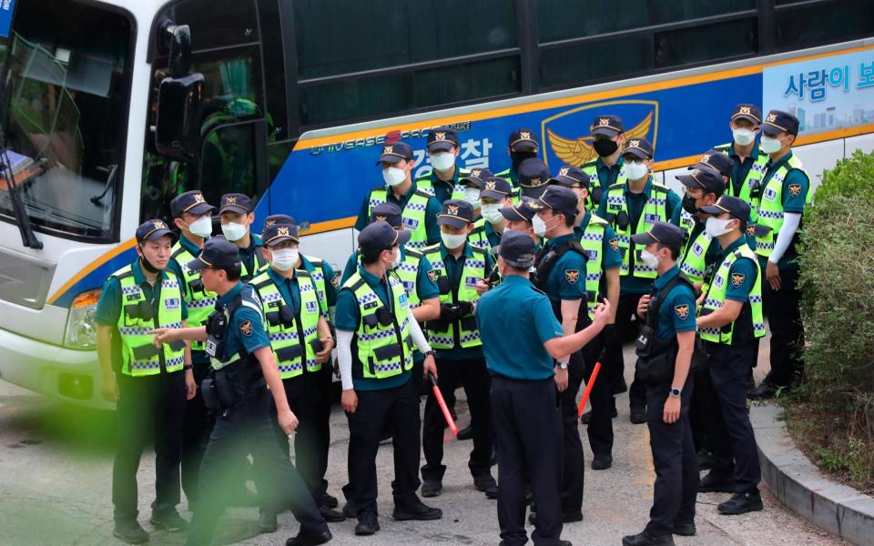 Over 100 police officers have been brought in to be part of the search - Kim Ju-sung/Yonhap