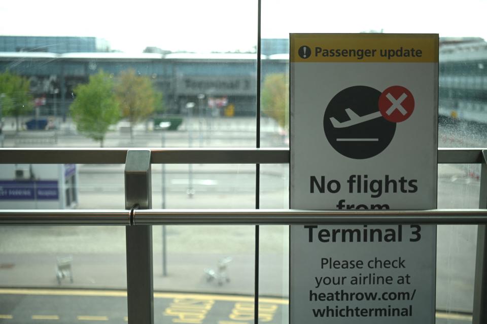 A sign displayed outside Terminal 3 at Heathrow airport in London on 3 June 2021 indicates that the terminal is closed to departure flights