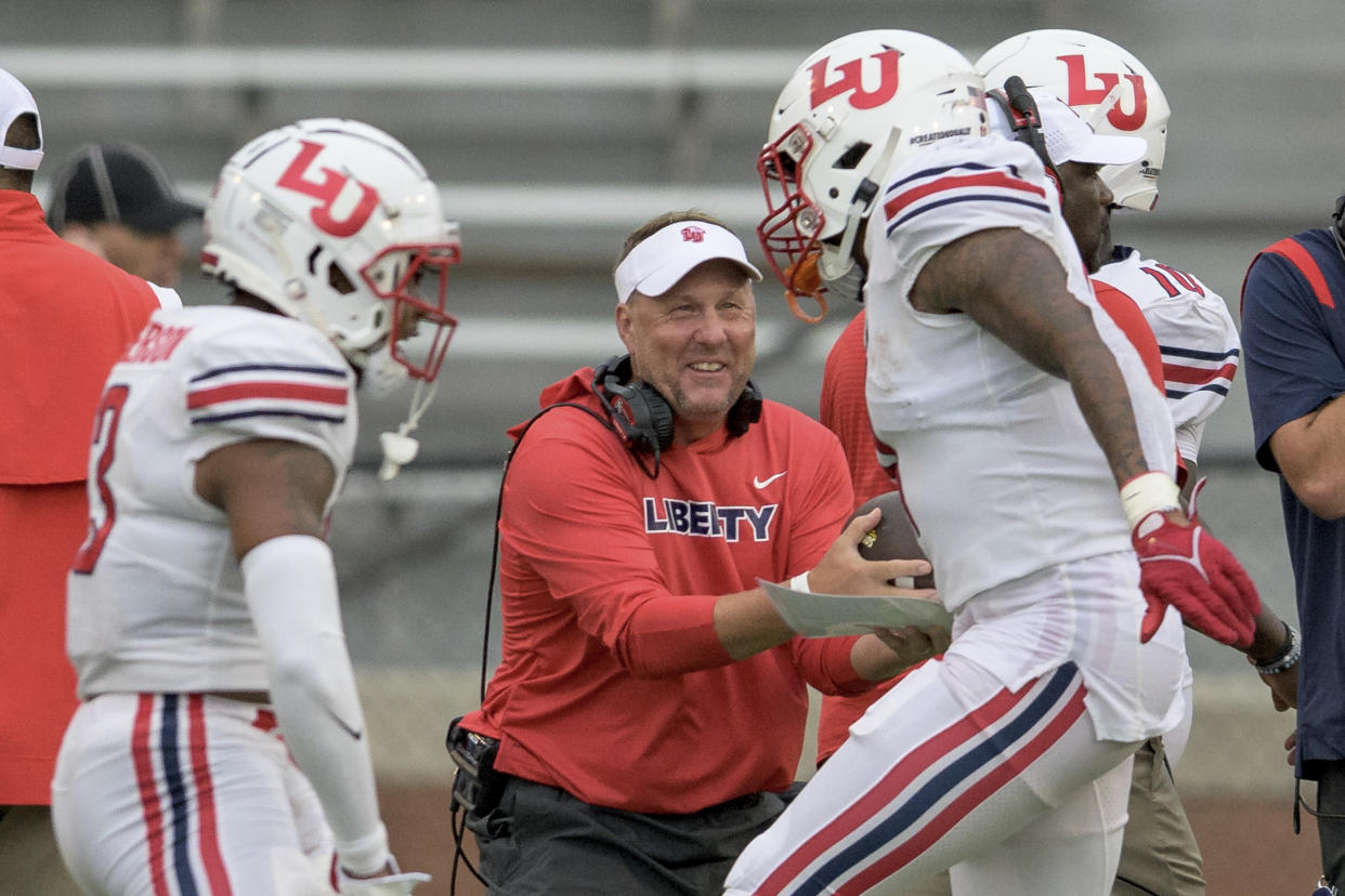 Liberty head coach Hugh Freeze brings his team on the road to face Arkansas this week in a game that should feature plenty of points. (AP Photo/Matthew Hinton)