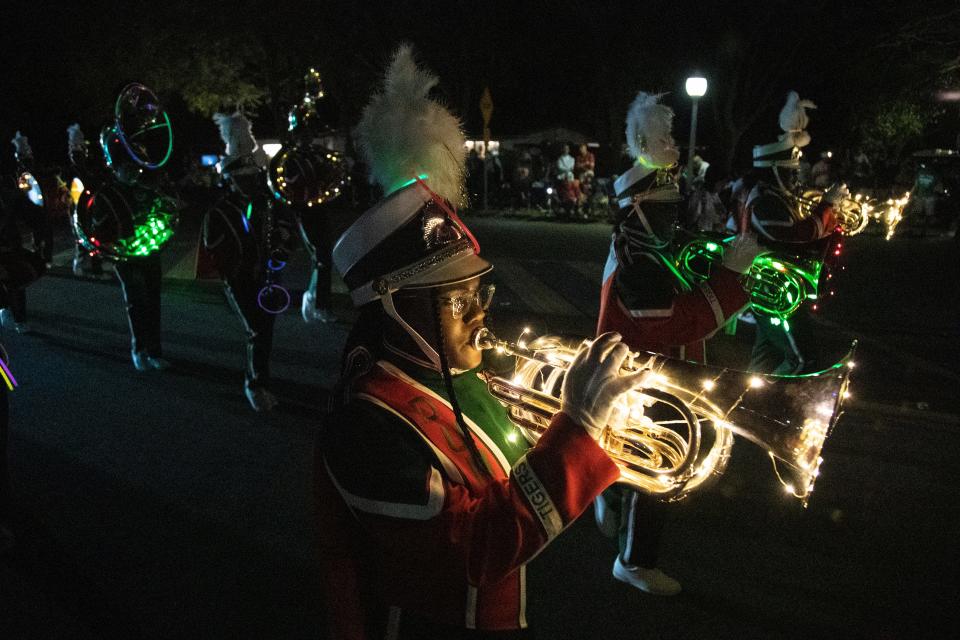 Ariana Irving performs with the Dunbar High School Band during the Edison Festival of Light Grand Parade on Saturday, Feb. 19, 2022, in Fort Myers.