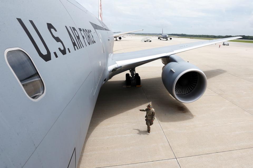 Tech. Sgt. Connor Cunio, a heavy equipment mechanic with the 157th Maintenance Group, inspects the KC-46 Pegasus after its flight Tuesday, June 27, 2023.