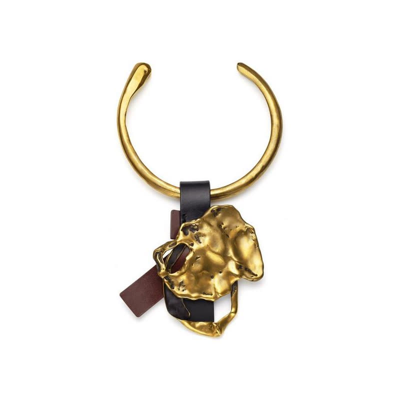 <a rel="nofollow noopener" href="http://www.tomford.com/bronze-and-leather-choker/JW0617-BVKEN.html?cgid=5-56&dwvar_JW0617-BVKEN_color=GUB#start=1" target="_blank" data-ylk="slk:Bronze And Leather Choker, Tom Ford, $2490;elm:context_link;itc:0;sec:content-canvas" class="link ">Bronze And Leather Choker, Tom Ford, $2490</a>