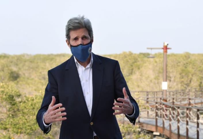 FILE PHOTO: U.S. climate envoy John Kerry speaks in Abu Dhabi