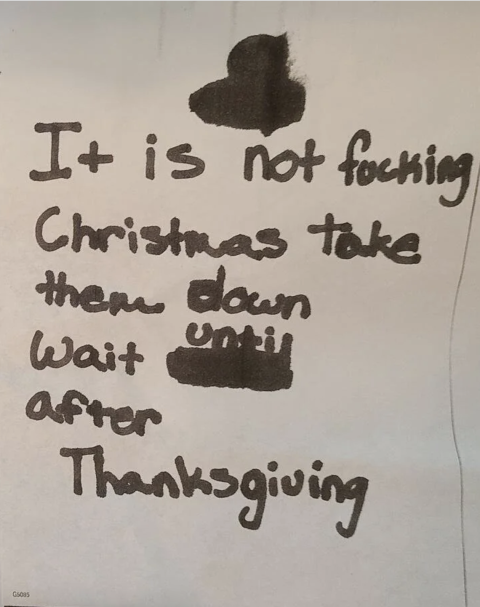 A second note says "It is not fucking Christmas, take them down and wait until after Thanksgiving"