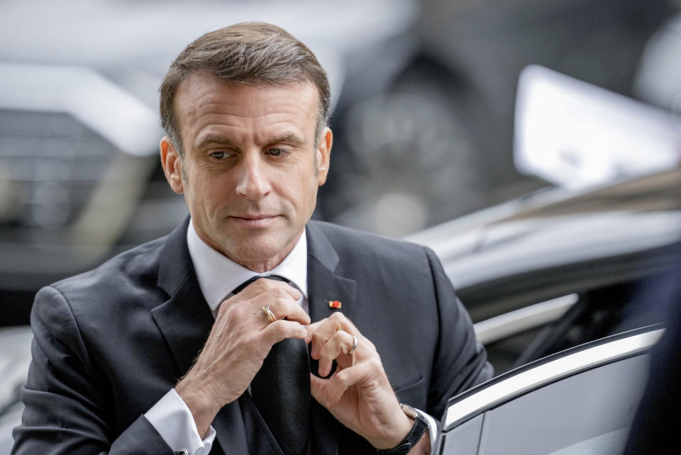 French President Emmanuel Macron arrives for a state act to commemorate late former German finance minister Wolfgang Schaeuble in the German parliament in Berlin, Germany, Monday, Nov.22, 2024. (AP Photo/Markus Schreiber, Pool)