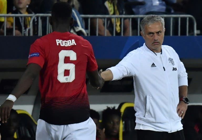 Paul Pogba (left) and Jose Mourinho are at loggerheads at Manchester United