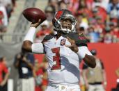 FILE - In this Sept. 13, 2015, file photo, Tampa Bay Buccaneers quarterback Jameis Winston (3) looks to throw the ball during the first half of an NFL football game against the Tennessee Titans in Tampa, Fla. Winston was the top pick in the draft that year and had a solid summer to win the starting job. He got off to a bad start in front of the home crowd, though, as his first pass was intercepted and returned for a touchdown by Coty Sensabaugh. (AP Photo/Chris O'Meara, File)
