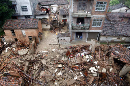 Damaged and collapsed buildings are seen as Typhoon Nepartak brings heavy rainfall in Putian, Fujian Province, China, July 9, 2016. Picture taken July 9, 2016. REUTERS/Stringer