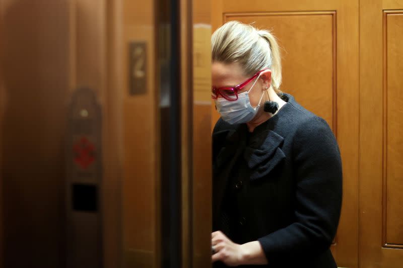 U.S. Senator Sinema departs the Senate floor after a vote at the U.S. Capitol in Washington