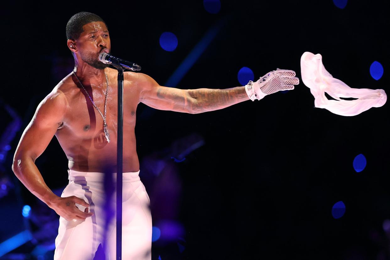 Usher performs during the Super Bowl halftime show on Feb. 11, 2024.