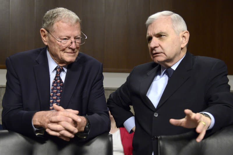 Senate Armed Services Committee Chairman James Inhofe, R-Okla., (L) chats with longtime friend and Ranking Member Jack Reed, D-R.I., on March 14, 2019. File Photo by Mike Theiler/UPI