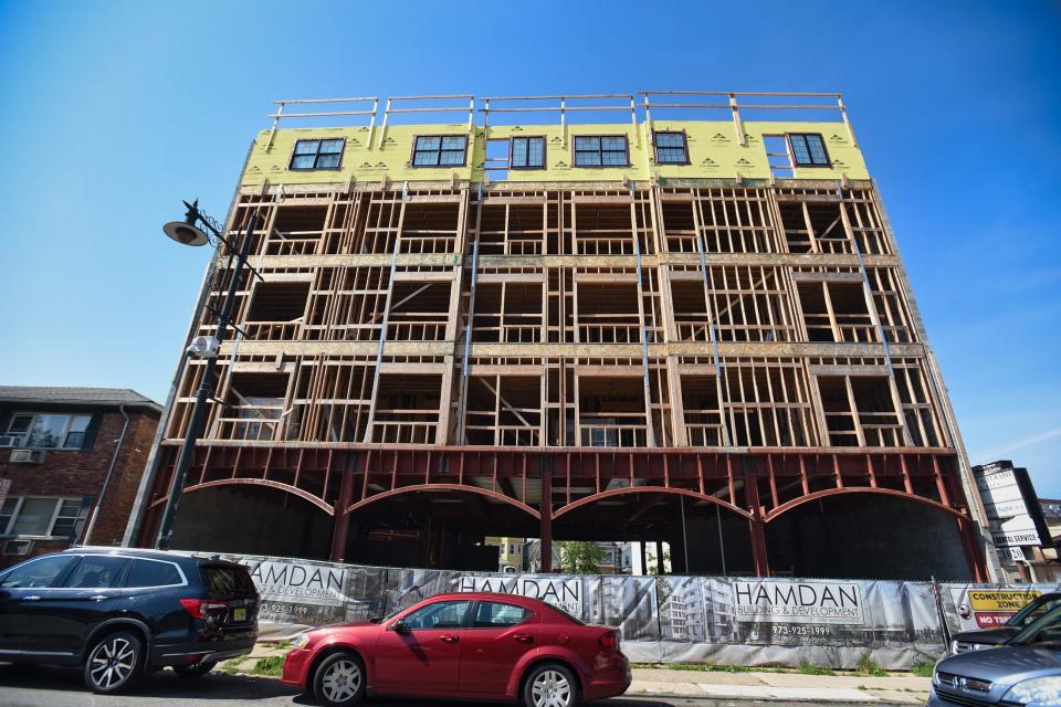 A retail and residential mixed development project under construction last summer in South Paterson. Andre Sayegh's challengers accuse him of selling out Paterson's best interests to developers but the mayor says he has helped to revitalize the city.