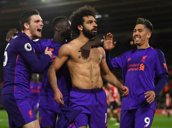 Mo Salah is mobbed after his goal against Southampton (Getty)