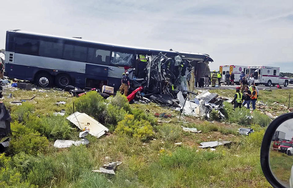 <p> This photo provided by Chris Jones shows first responders working the scene of a collision between a Greyhound passenger bus and a semi-truck on Interstate 40 near the town of Thoreau, N.M., near the Arizona border, Thursday, Aug. 30, 2018. Multiple people were killed and others were seriously injured. Officers and rescue workers were on scene but did not provide details about how many people were killed or injured, or what caused the crash. (Chris Jones via AP) </p>