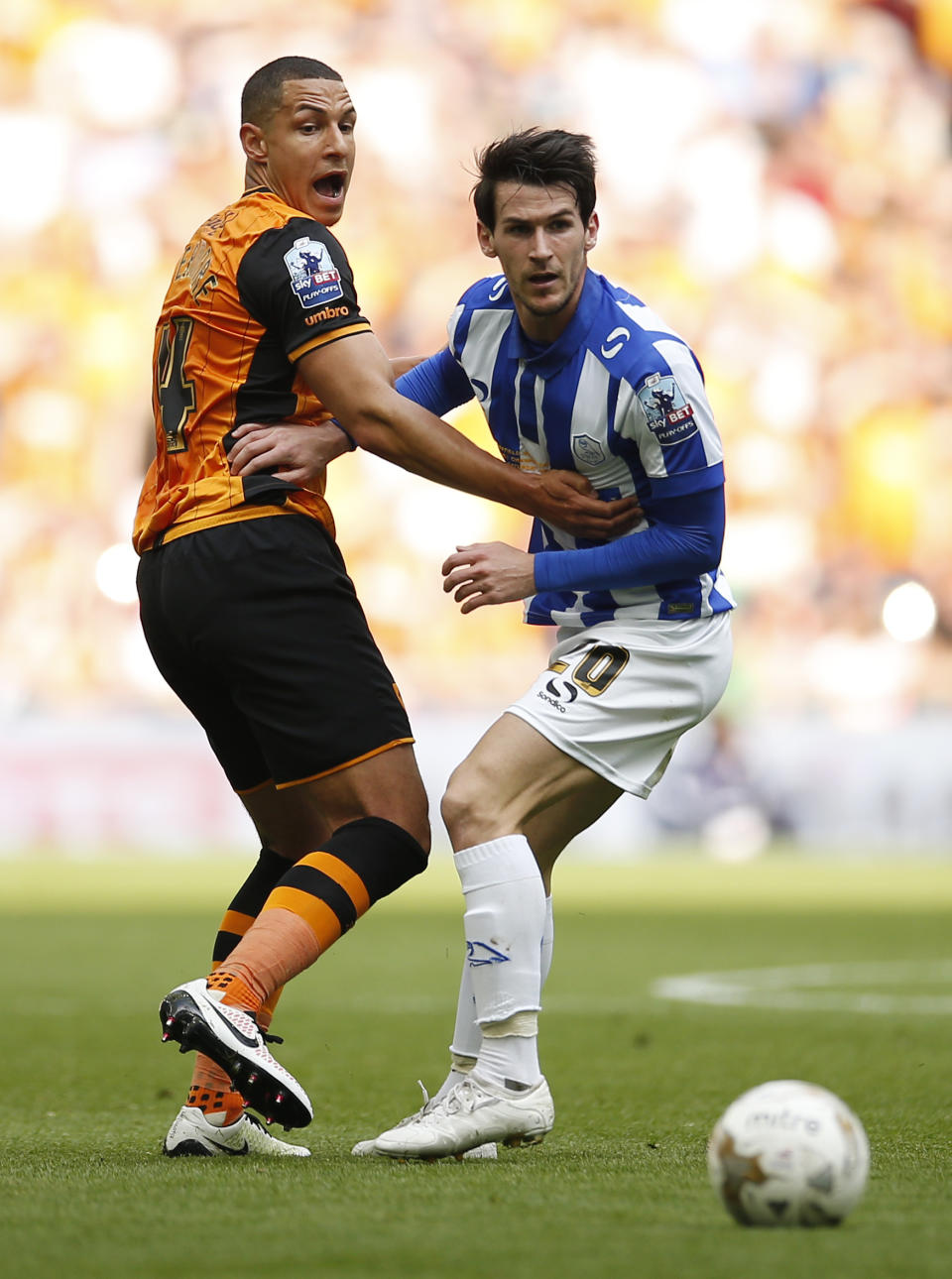 Britain Soccer Football - Hull City v Sheffield Wednesday - Sky Bet Football League Championship Play-Off Final - Wembley Stadium - 28/5/16 Hull City's Jake Livermore in action with Sheffield Wednesday's Kieran Lee Action Images via Reuters / Andrew Couldridge Livepic EDITORIAL USE ONLY. No use with unauthorized audio, video, data, fixture lists, club/league logos or "live" services. Online in-match use limited to 45 images, no video emulation. No use in betting, games or single club/league/player publications. Please contact your account representative for further details.